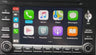 An image depicting the PCM3 radio display in a Porsche, showcasing the Apple CarPlay interface. The display highlights compatibility with several Porsche models including the 911, Boxster, Cayman from 2009-2012, and the Cayenne from 2009-2010. The focus is on the technological upgrade that integrates modern smartphone features into the vehicle's existing system using RDVFL's CP1-PCM3 that adds wireless CarPlay to Porsche Vehicles w/ PCM3 Radio